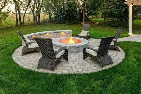 image of round fire pit with pavers and chairs