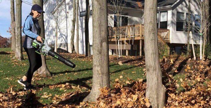 Woman using EGO Battery Powered Leaf Blower