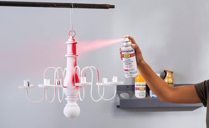 photo of spray painting a light fixture